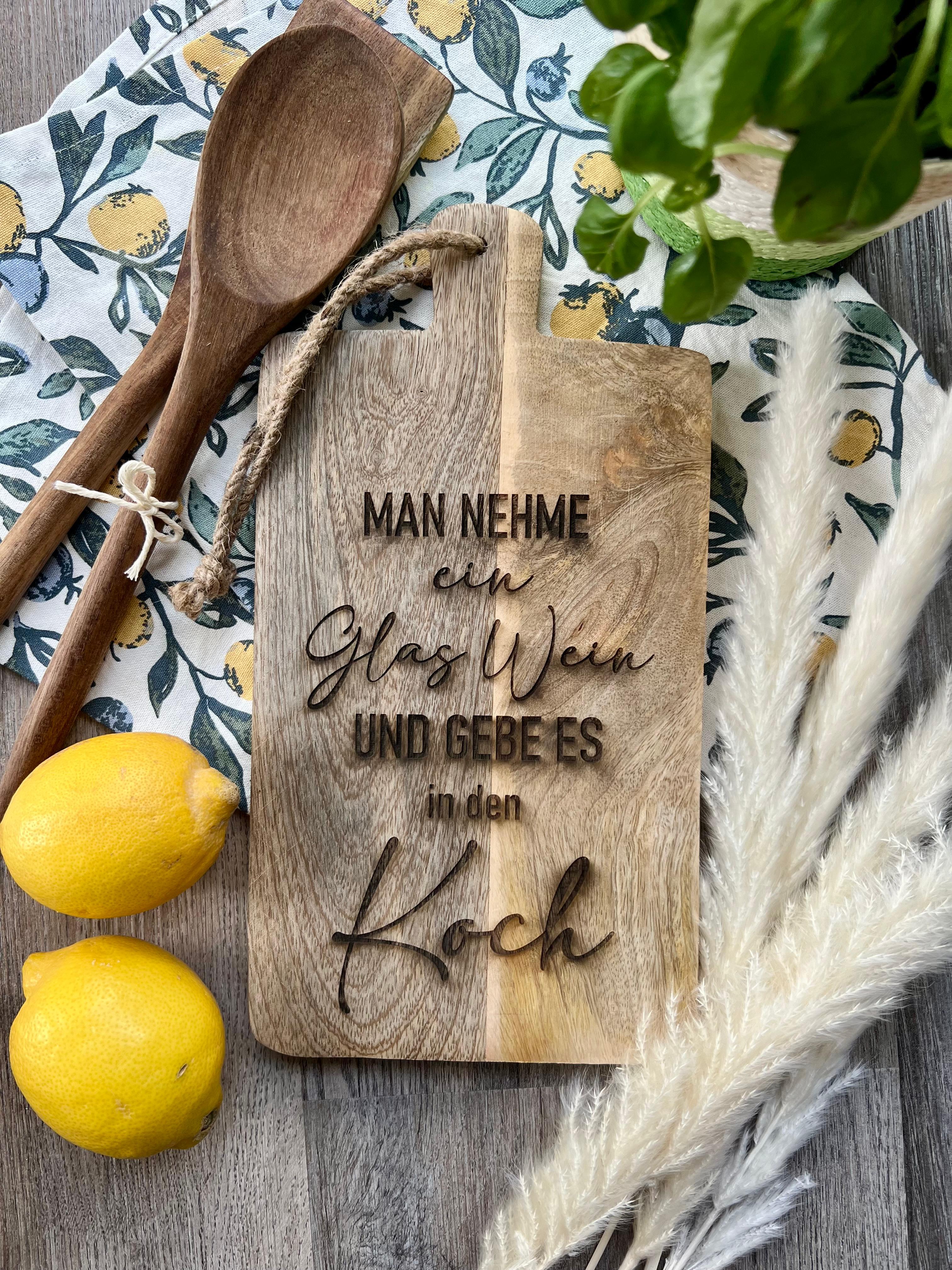 Schneidebrett "Man nehme ein Glas Wein und gebe es in den Koch"